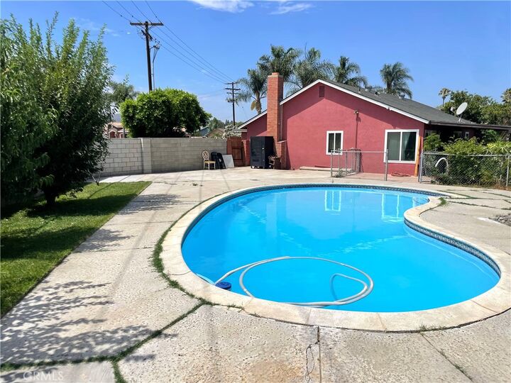 Property Photo:  6710 Mia Avenue  CA 92503 
