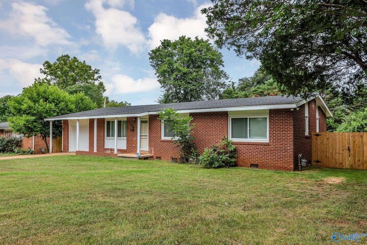 Property Photo: 3107 Acklen Drive SW AL 35805