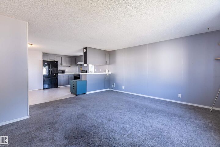 Photo de la propriété:  10410 101A Street 5  AB T8R 1A1 