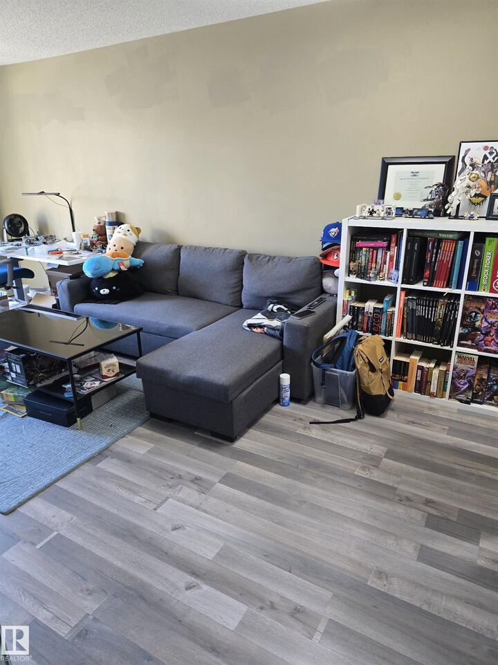 Property Photo: 11441 Ellerslie Road SW 403 AB T6W 1S9