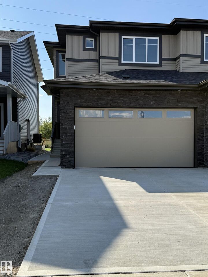 Property Photo: 66 Waverly Wy AB T8L 3L7