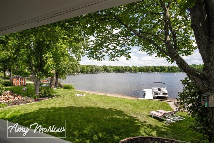 Property Photo:  8360 Bay Drive NE  MI 49341 