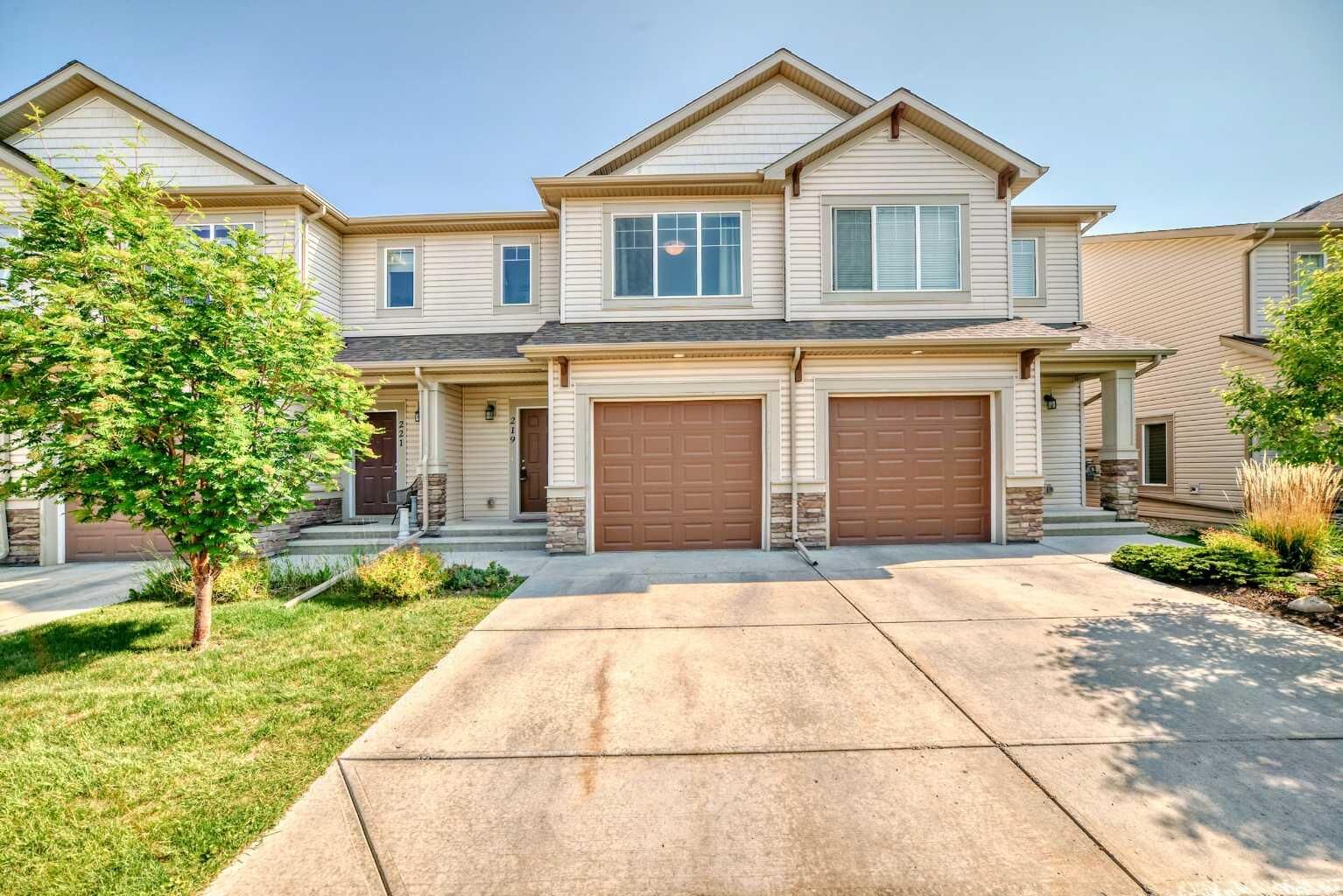 Property Photo: 219 Sunset Point AB T4C 0L2