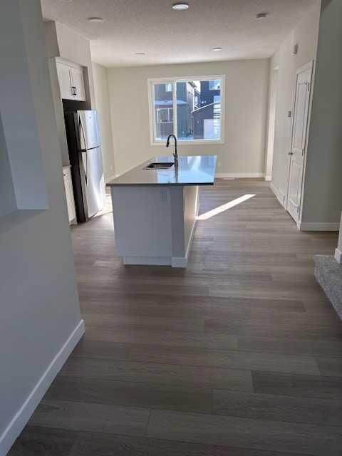 Property Photo: 619 Savanna Crescent NE AB T3J 5P2