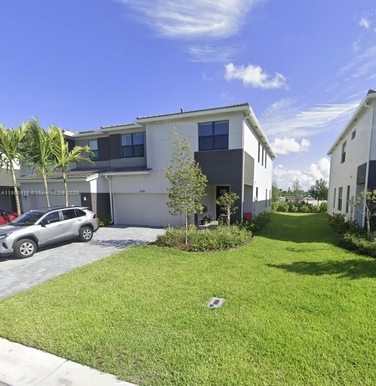 Property Photo: 8719 Antarus Dr FL 33467