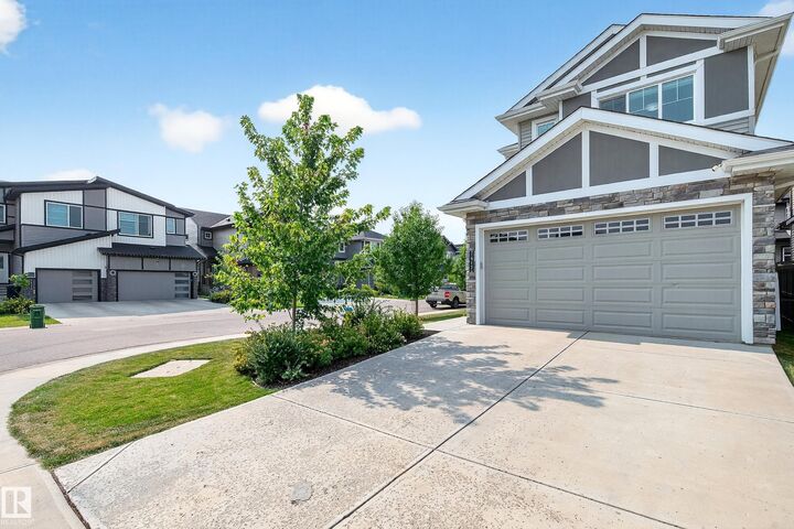 Property Photo: 7417 Chivers Crescent SW AB T6W 4M2