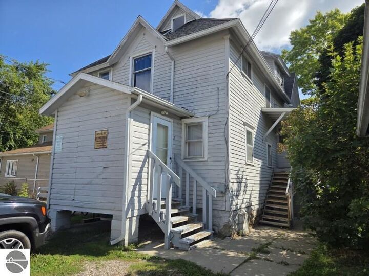 Property Photo:  1004 S University  MI 48858 