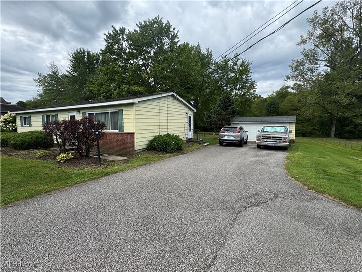 Property Photo:  8810 Auburn Road  OH 44024 