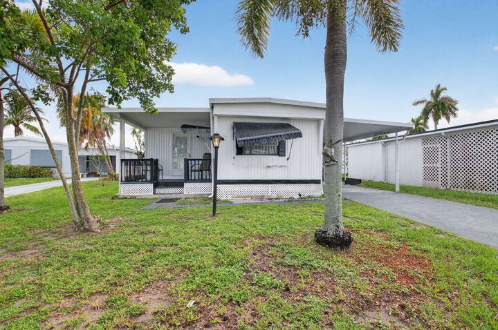 Property Photo:  12375 S Military Trail 201  FL 33436 