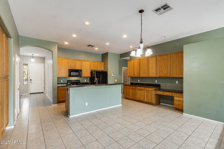 Property Photo:  13825 W San Miguel Avenue  AZ 85340 