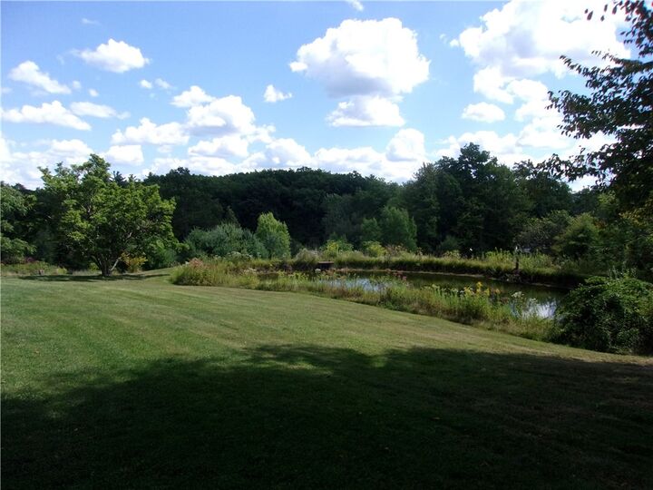Property Photo:  8116 Harpers Ferry Road  NY 14560 