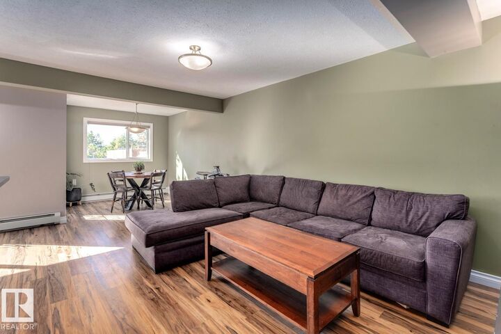 Property Photo: 11033 127 Street NW 209 AB T5M 0T3