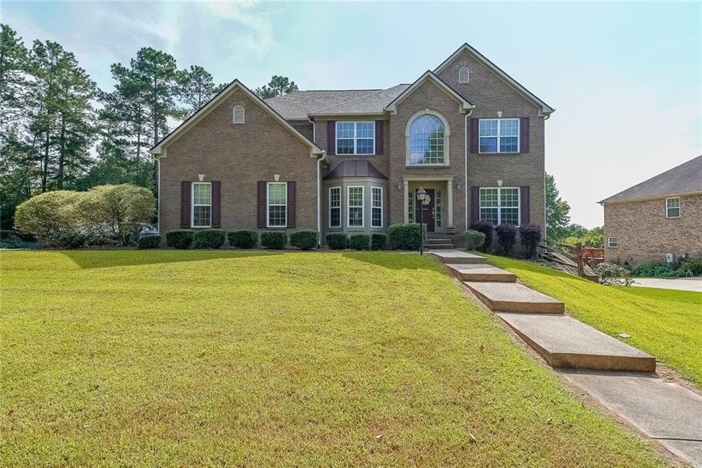 Property Photo:  7580 The Lakes Drive  GA 30213 
