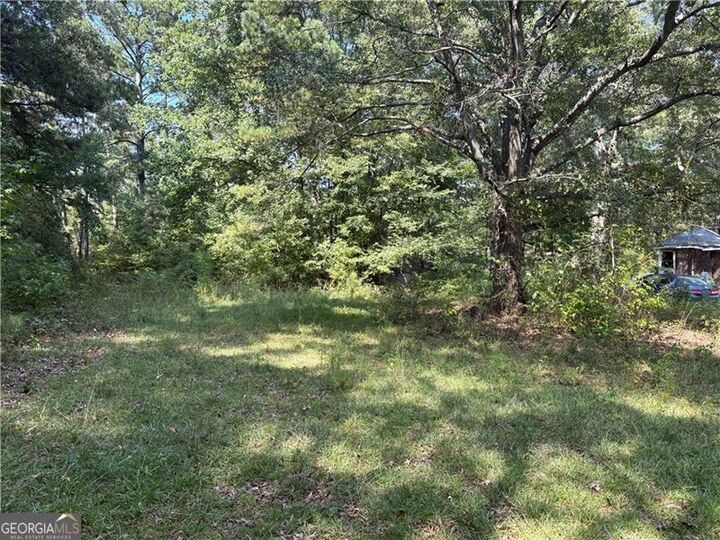 Property Photo:  6355 Kimberly Mill Road  GA 30349 