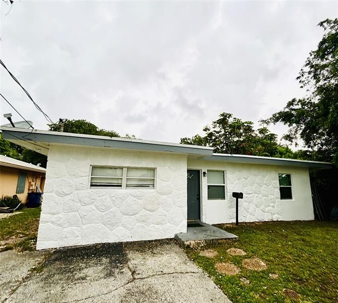 Property Photo: 1025 NW 8th St FL 33009