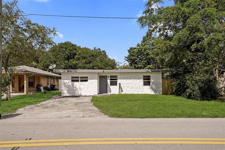 Property Photo: 1025 NW 8th St FL 33009