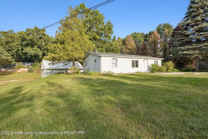 Property Photo:  9991 W Stoll Road  MI 48840 