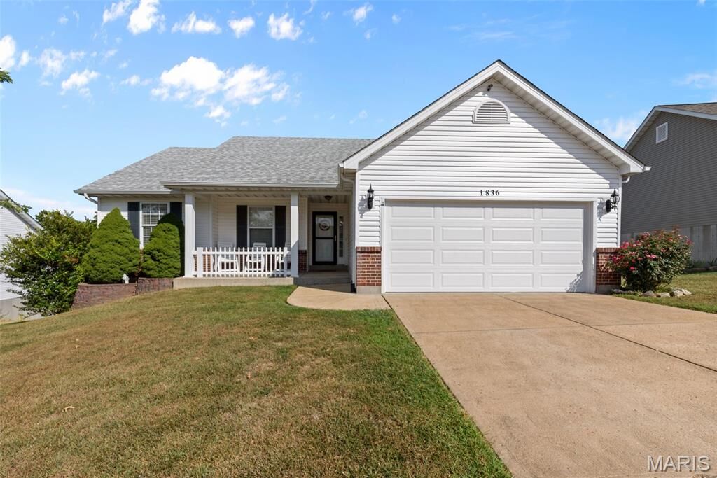 Property Photo:  1836 Championship Lane  MO 63028