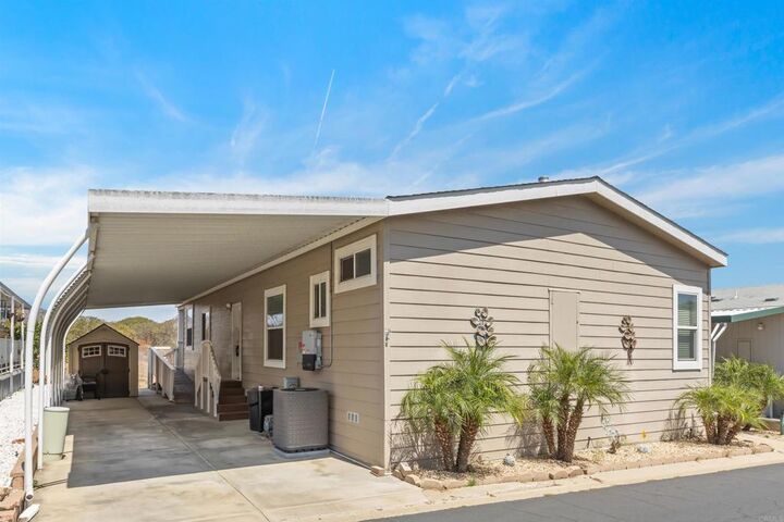 Property Photo:  9500 Harritt Rd 29  CA 92040 