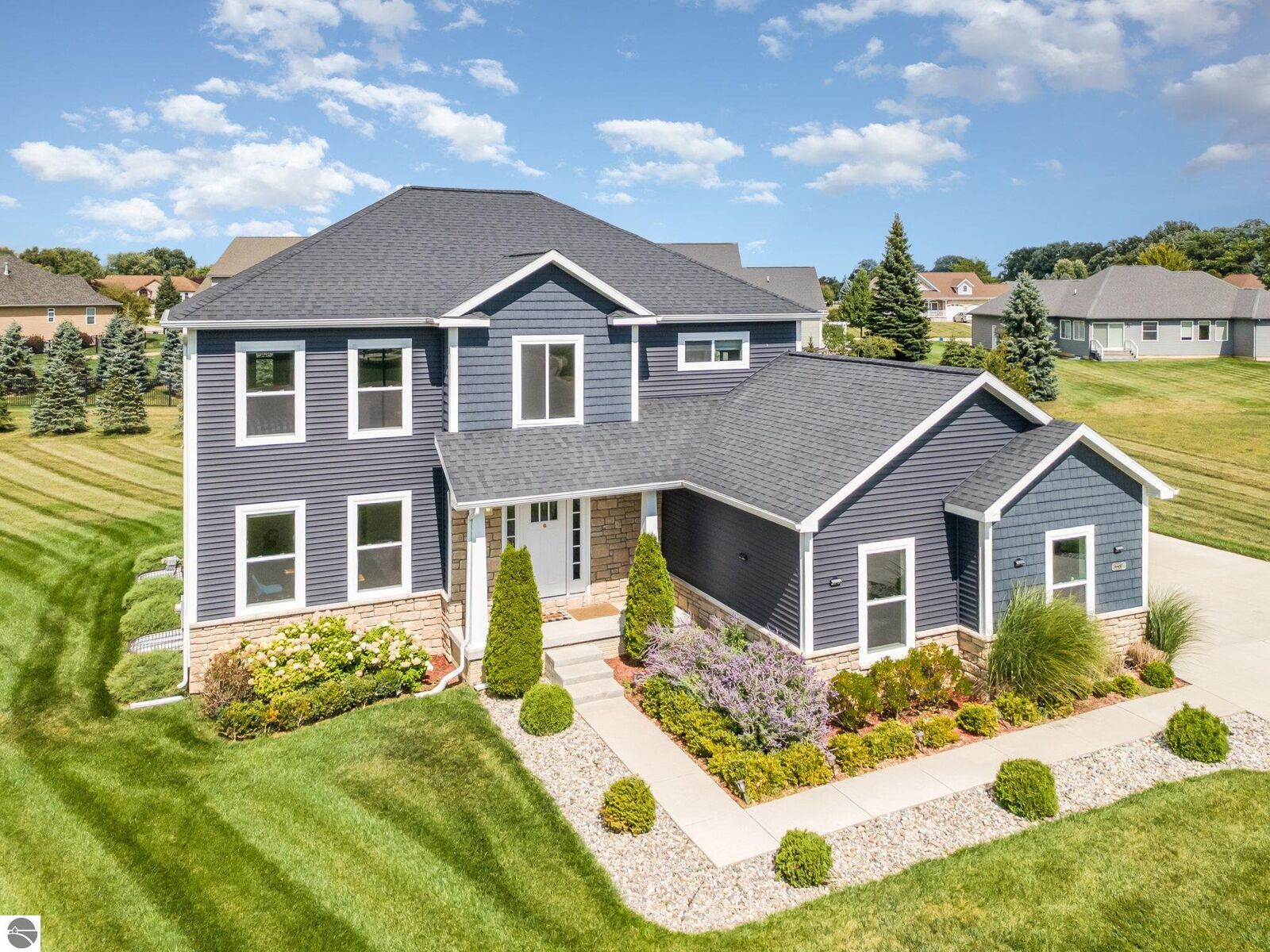 Property Photo:  2275 Sandstone Drive  MI 48858 