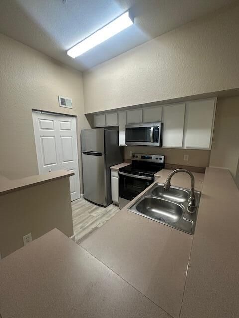 Property Photo: 171 SW Palm Drive 208 FL 34986