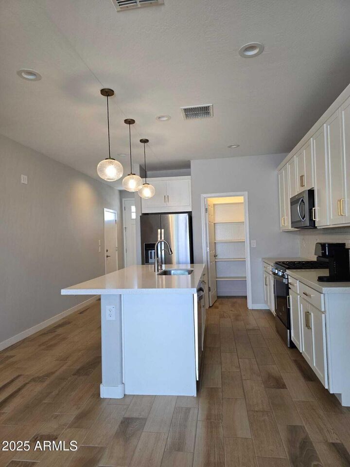 Property Photo:  10968 W Baden Street  AZ 85323 