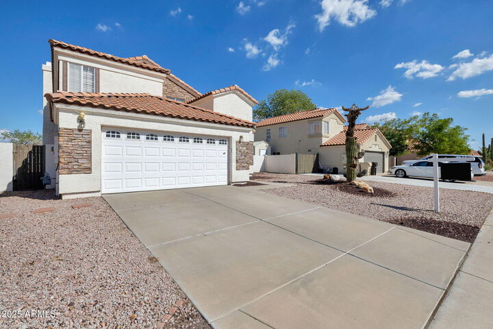 Property Photo: 18071 N 91st Drive AZ 85382