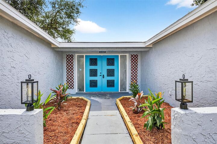 Property Photo: 9633 Lakeside Lane FL 34668