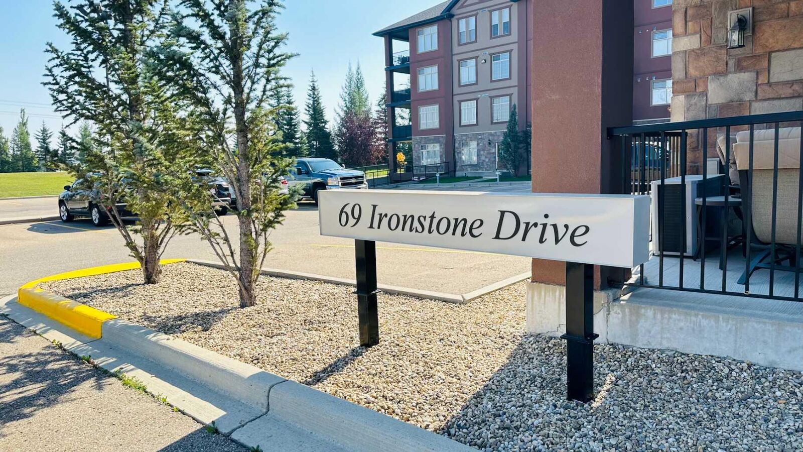 Property Photo: 69 Ironstone Drive 303 AB T4R 0J8
