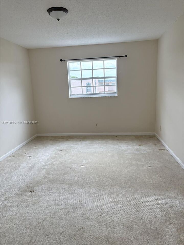 Property Photo:  4140 NW 44th Ave 411  FL 33319 