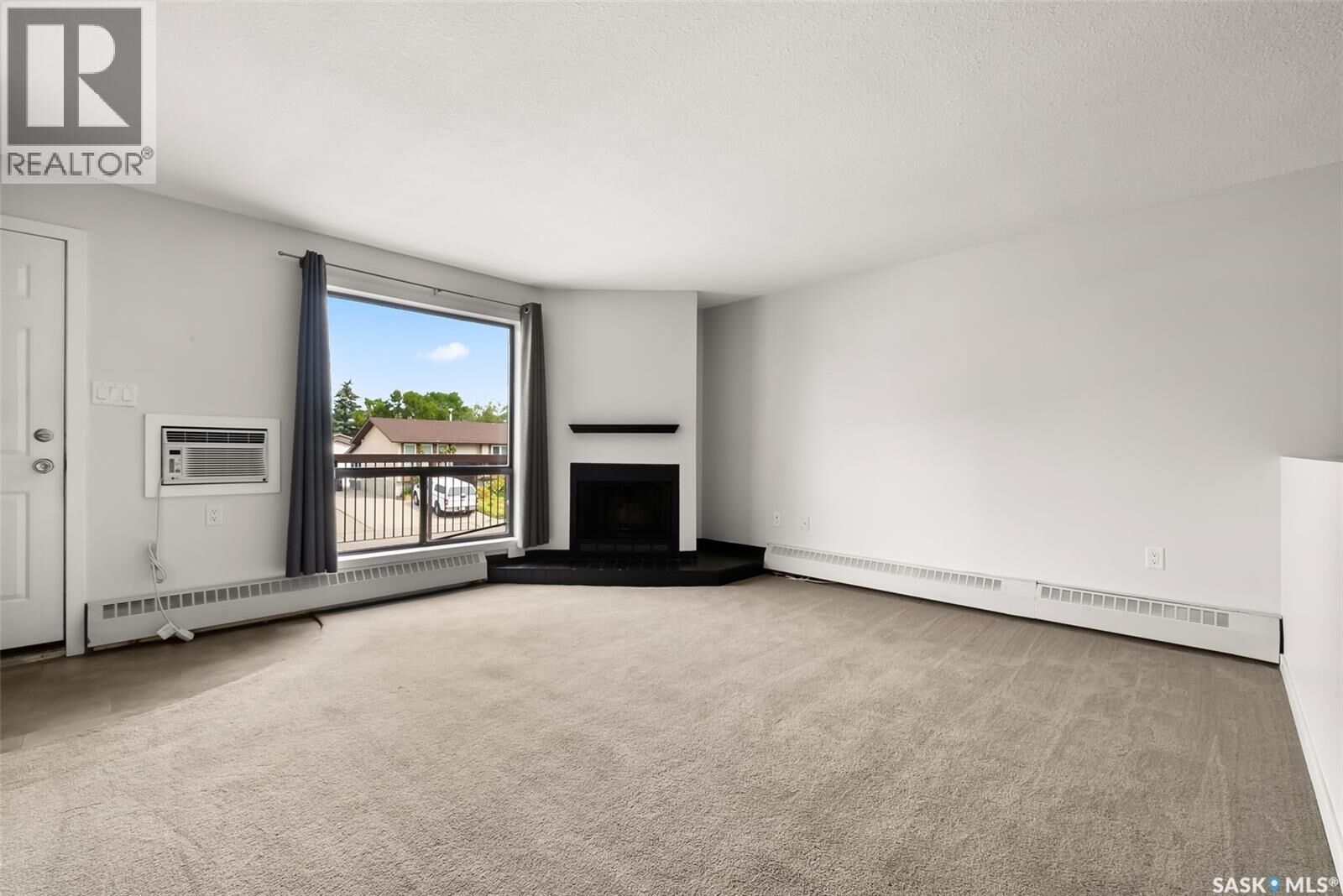 Property Photo:  203 2511 Neff Road  SK S4V 1C1 