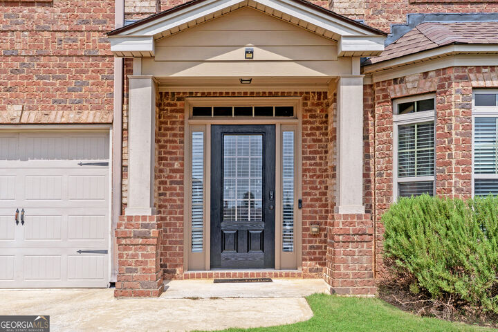 Property Photo: 9786 Hurston Way GA 30238