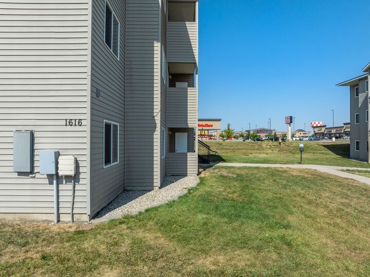 Property Photo:  1616 20th Ave #101 NW  ND 58703 