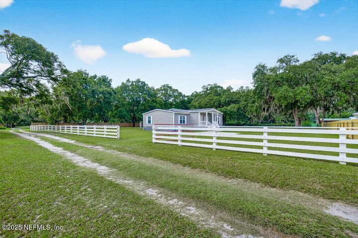 Property Photo:  85208 Airplane Lane  FL 32097
