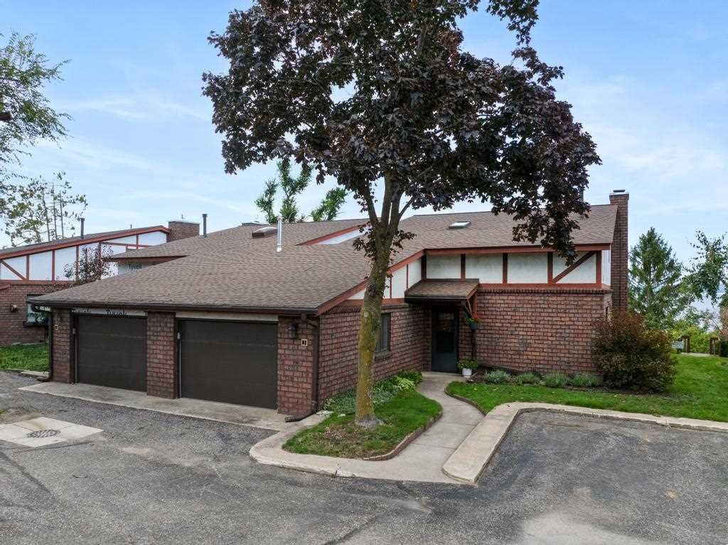 Property Photo:  1200 Charlevoix Ave 3  MI 49770 