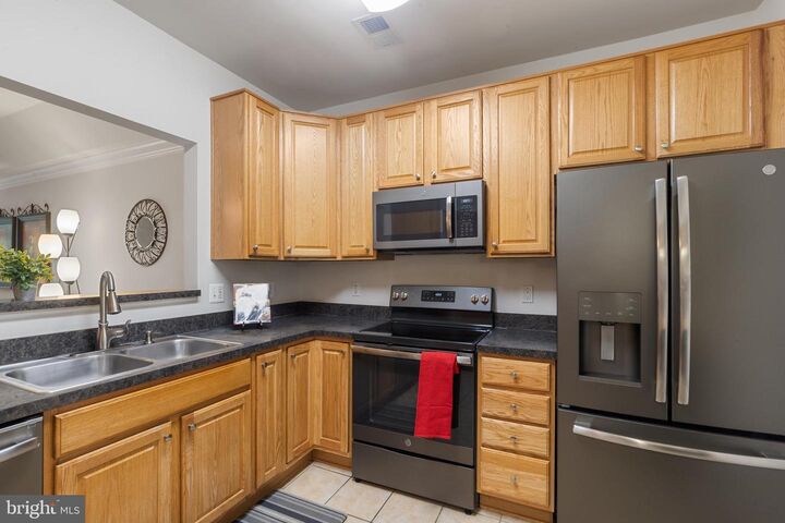 Property Photo: 6155 Shadywood Road 204 MD 21075