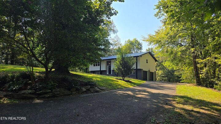 Property Photo:  711 Omega Drive  TN 37397 