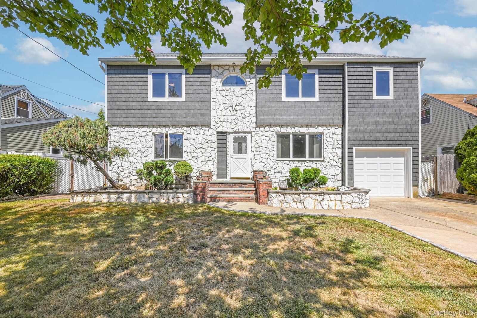 Property Photo:  203 N Manhattan Avenue  NY 11758 