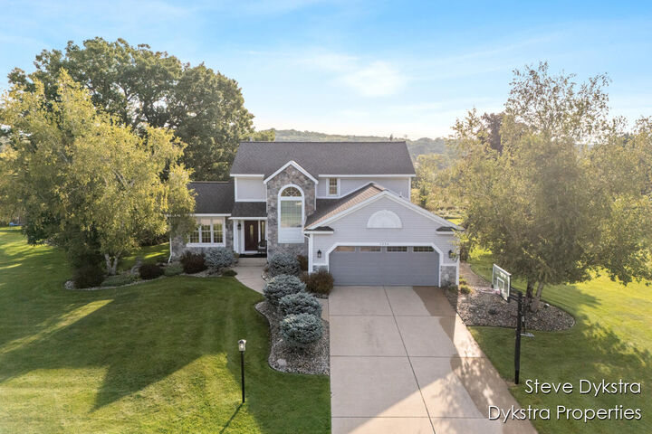 Property Photo:  2264 Grand Valley Drive NE  MI 49301 