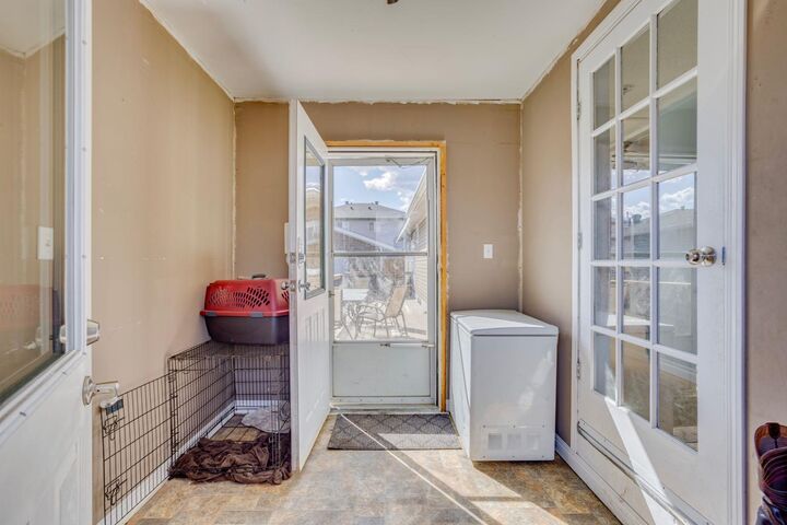 Property Photo:  244 Cokerill Crescent  AB T9K 2J2 
