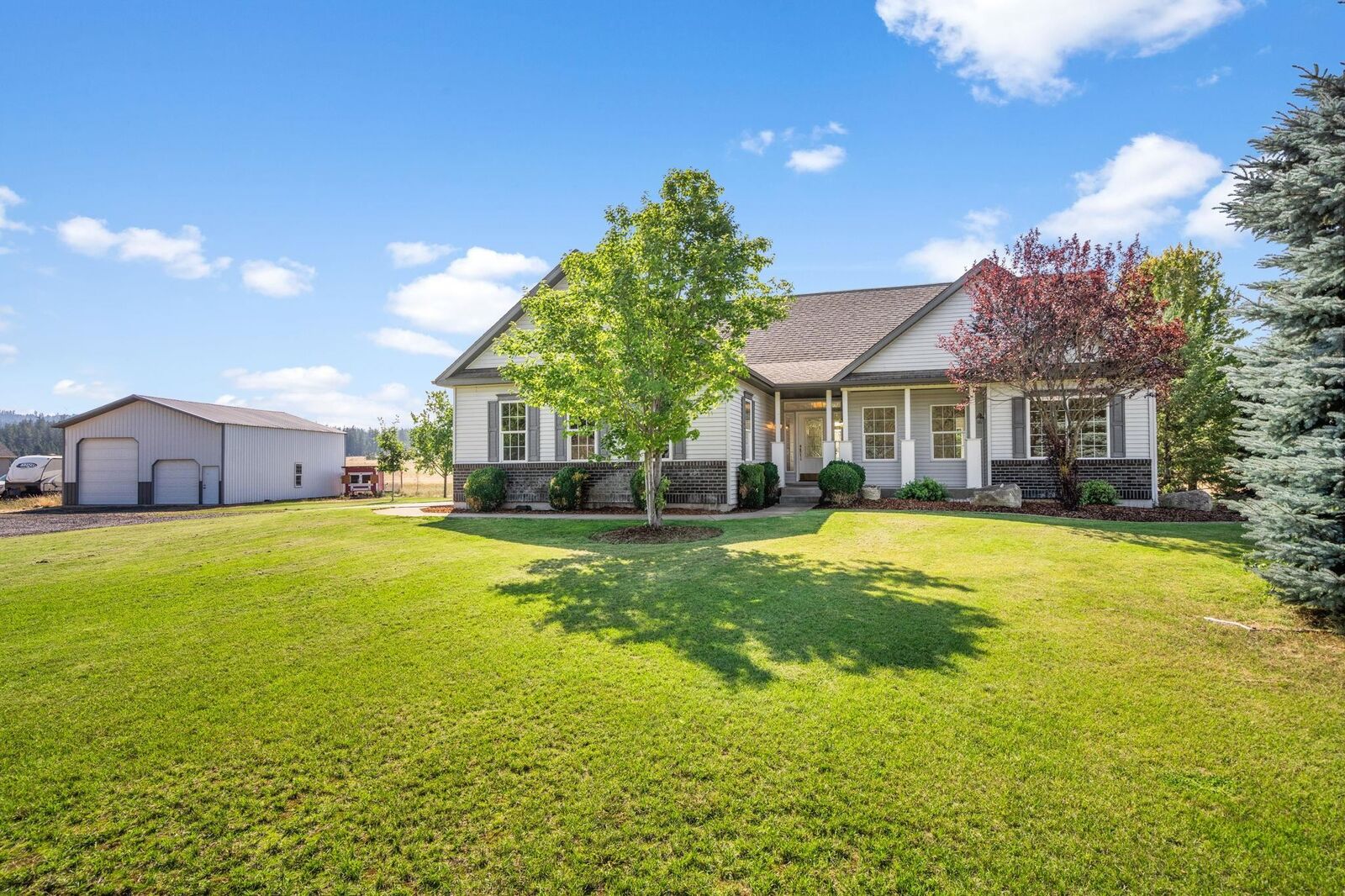 Property Photo:  6915 W Rutter Pkwy  WA 99208 