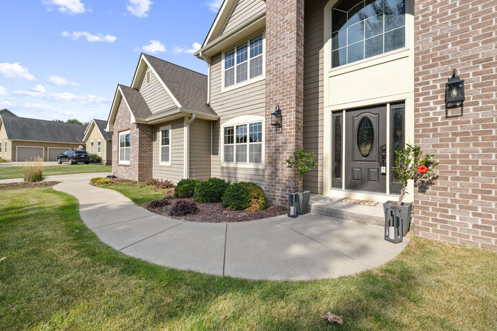 Property Photo: 120 Kestrel Way WI 53029