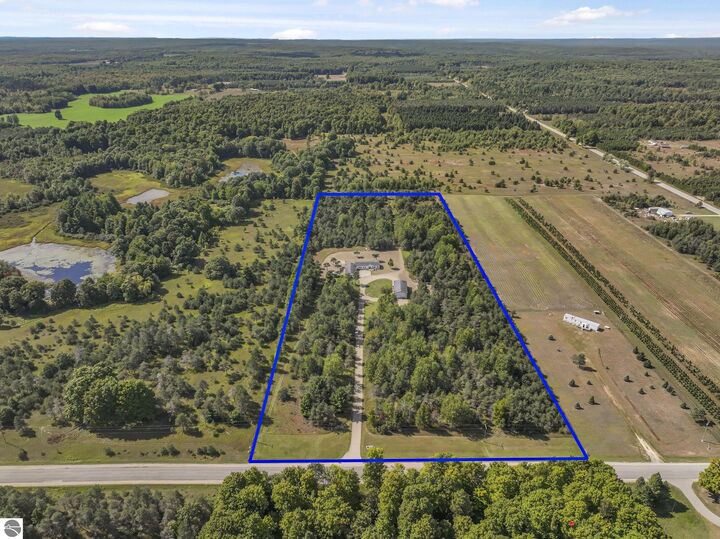Property Photo:  9771 N Wilson Road  MI 49651