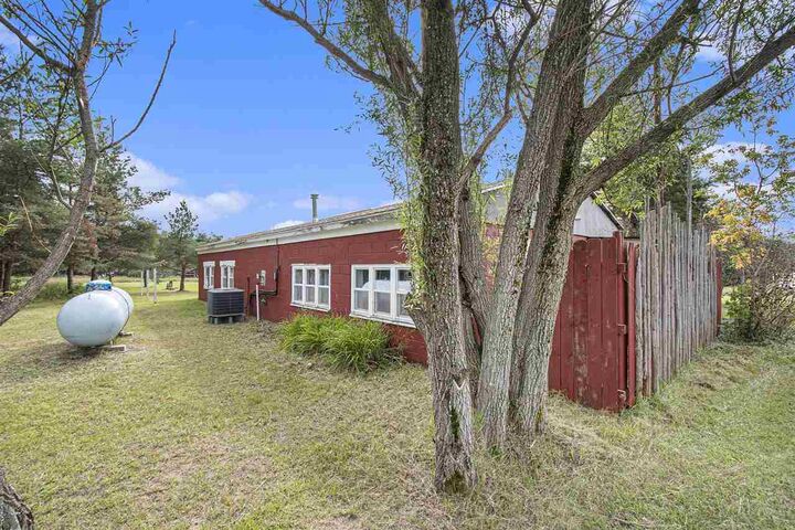 Property Photo:  309 Creekside Dr  MI 49755