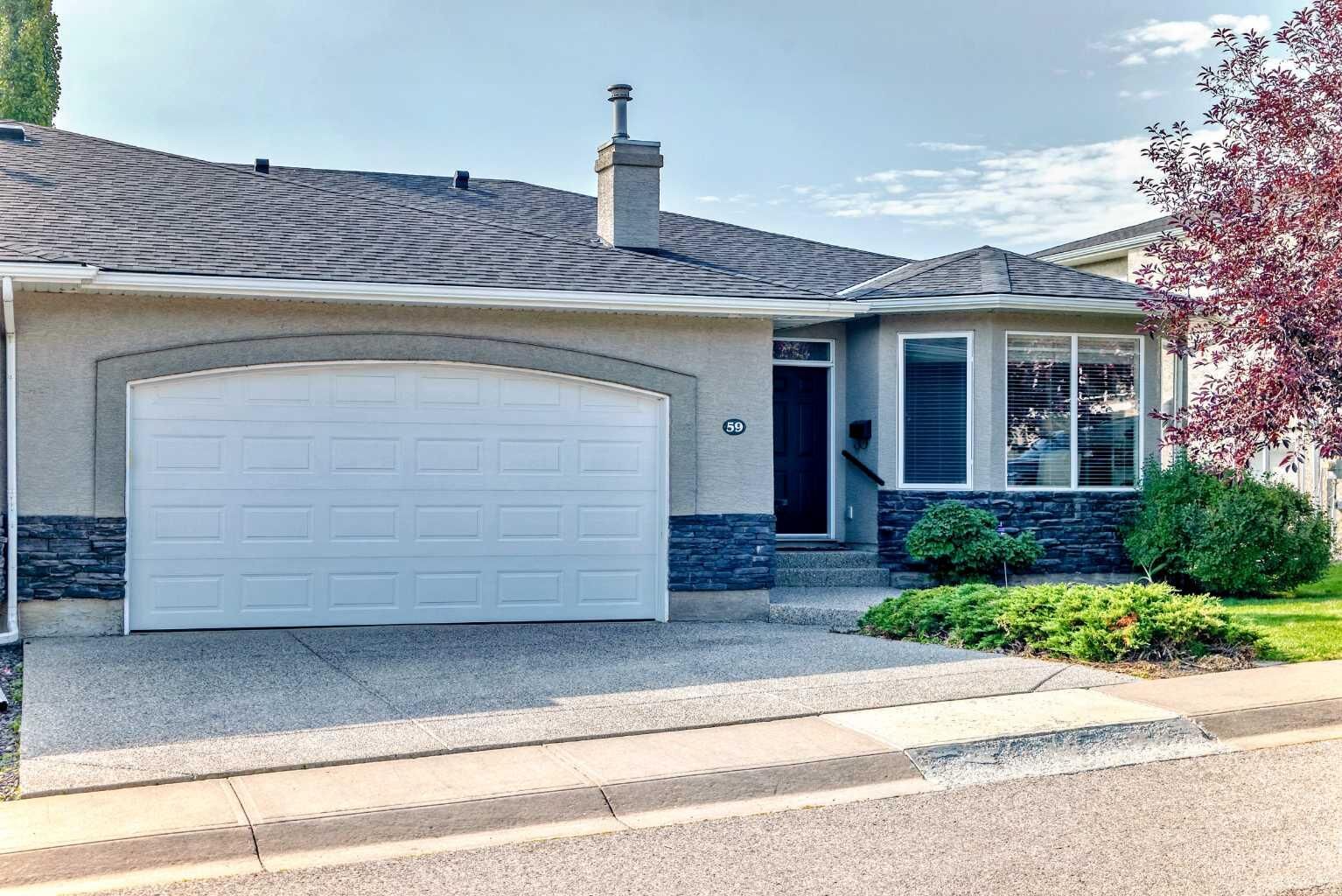 Property Photo: 59 Elysian Crescent SW AB T3H 0E7