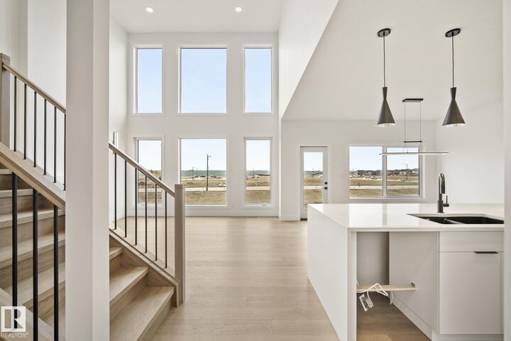 Property Photo:  7095 Kiviaq Crescent SW  AB T6W 5N7 