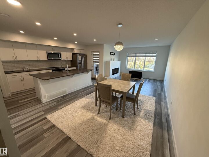 Property Photo:  20303 16 Avenue NW  AB T6M 1K8 