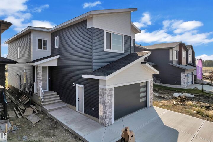 Property Photo: 8913 Mayday Way SW AB T6X 3E6