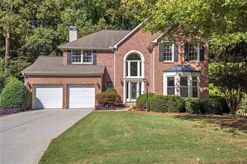 Property Photo:  1895 Oak Tree Hollow  GA 30005 