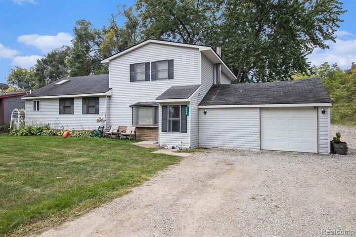 Property Photo:  1904 Viola Drive  MI 48462 8886 